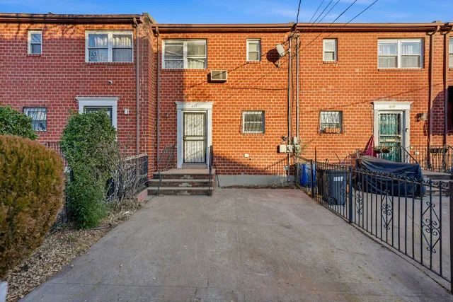 a view of backyard with green space