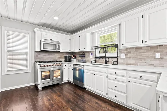 $550,000 | 4017 Northeast Channel Drive, Lee's Summit, MO 64064