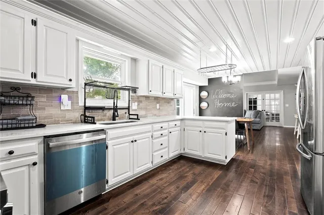 $545,000 | 4017 Northeast Channel Drive, Lee's Summit, MO 64064