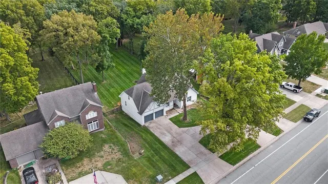 $550,000 | 4017 Northeast Channel Drive, Lee's Summit, MO 64064