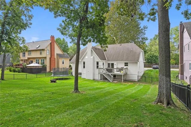 $550,000 | 4017 Northeast Channel Drive, Lee's Summit, MO 64064