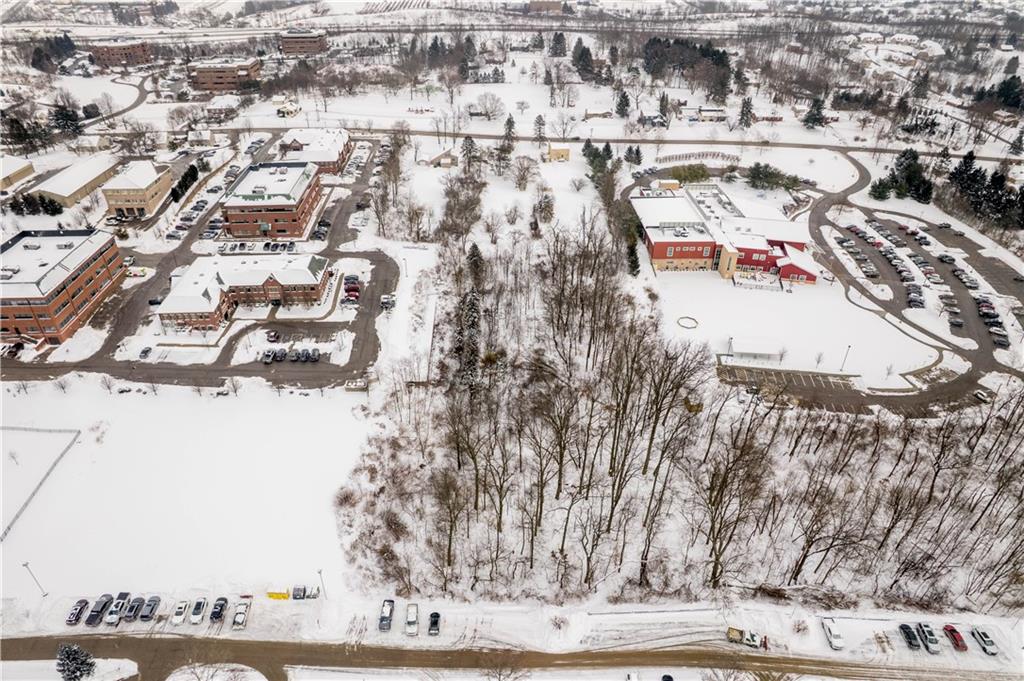 2573 Nicholson Road Sewickley, PA 15143 - Photo 15 of 18 an aerial view of residential houses with yard and trees in the background