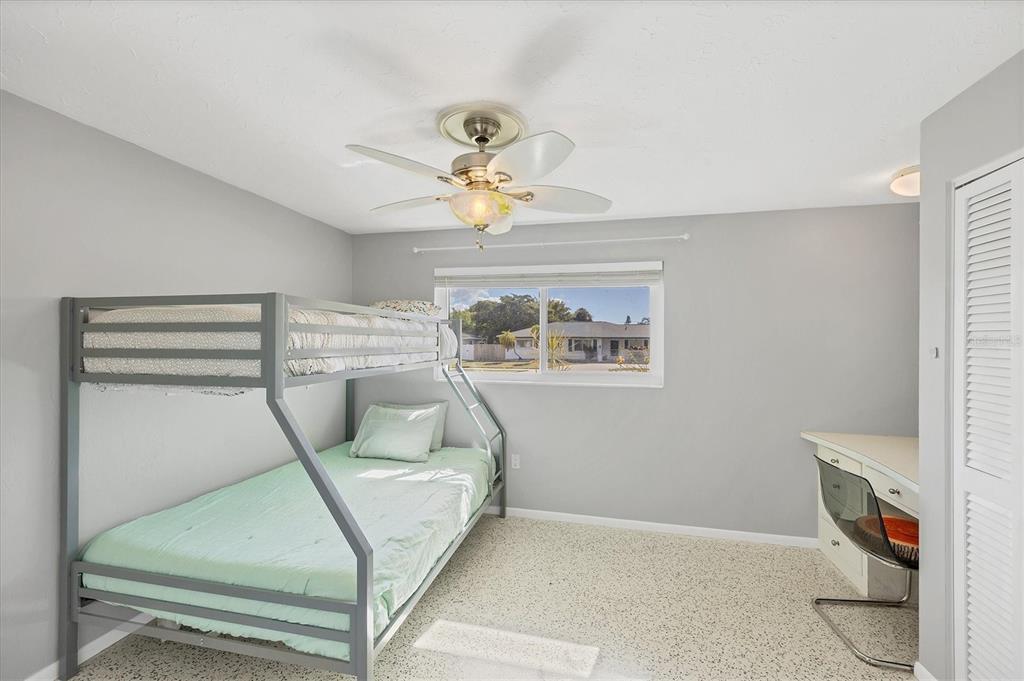 2927 Webber Street Sarasota, FL 34239 - Photo 18 of 27 a living room with furniture and a chandelier
