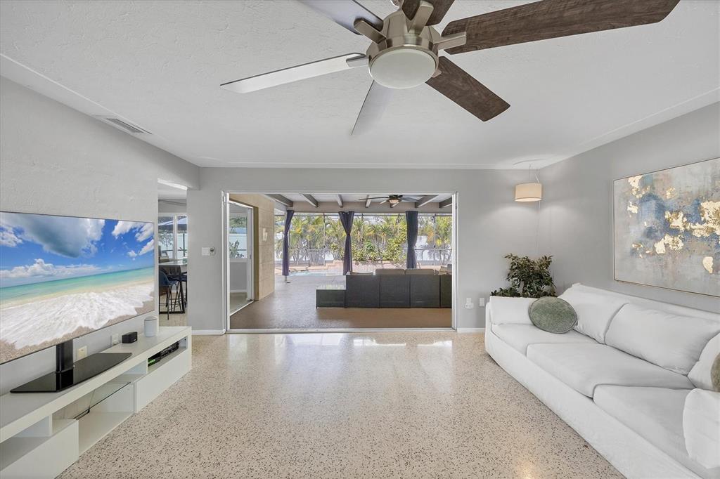 2927 Webber Street Sarasota, FL 34239 - Photo 3 of 27 a living room with furniture and a large window
