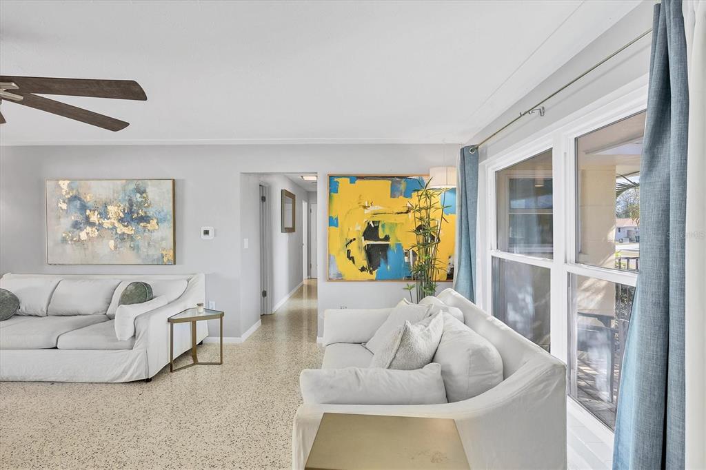 2927 Webber Street Sarasota, FL 34239 - Photo 4 of 27 a living room with furniture and a large window