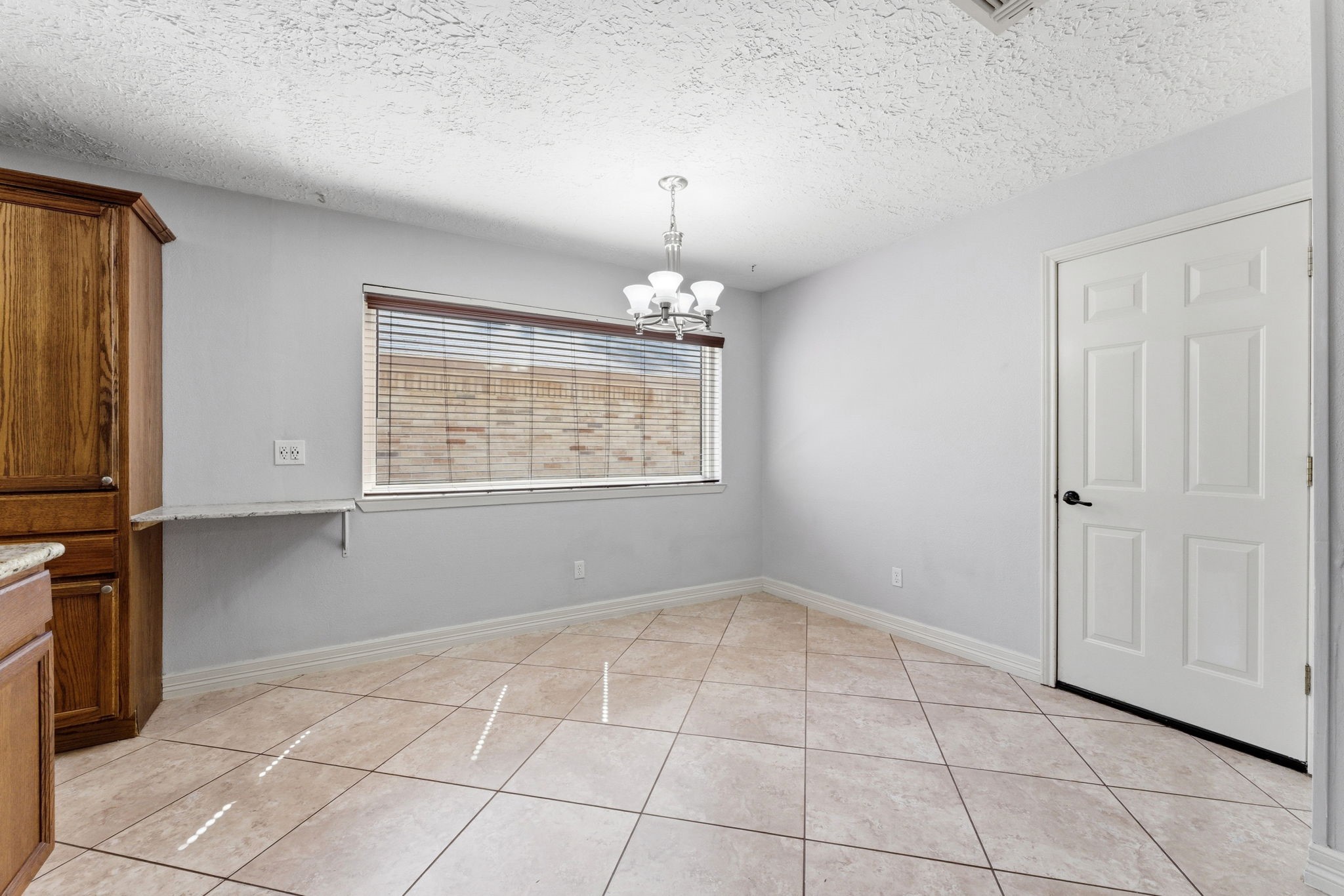 21514 Slippery Creek Lane Spring, TX 77388 - Photo 12 of 27 a view of an empty room with a window