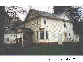 Church Street Springville, PA 18844 - Photo 1 of 1 a black and white photo of a house