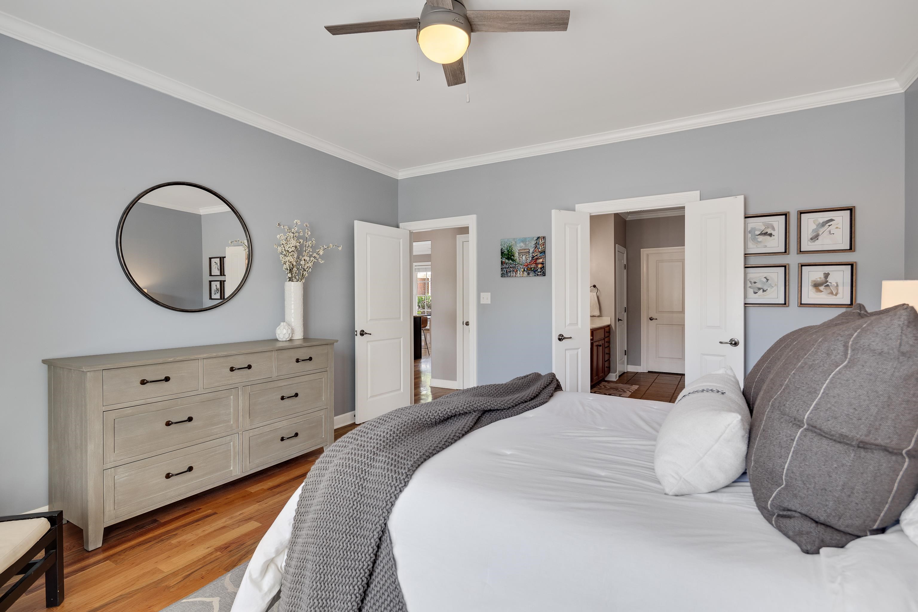 808 Deloach Lane Collierville, TN 38017 - Photo 17 of 40 a bedroom with a bed and a dresser