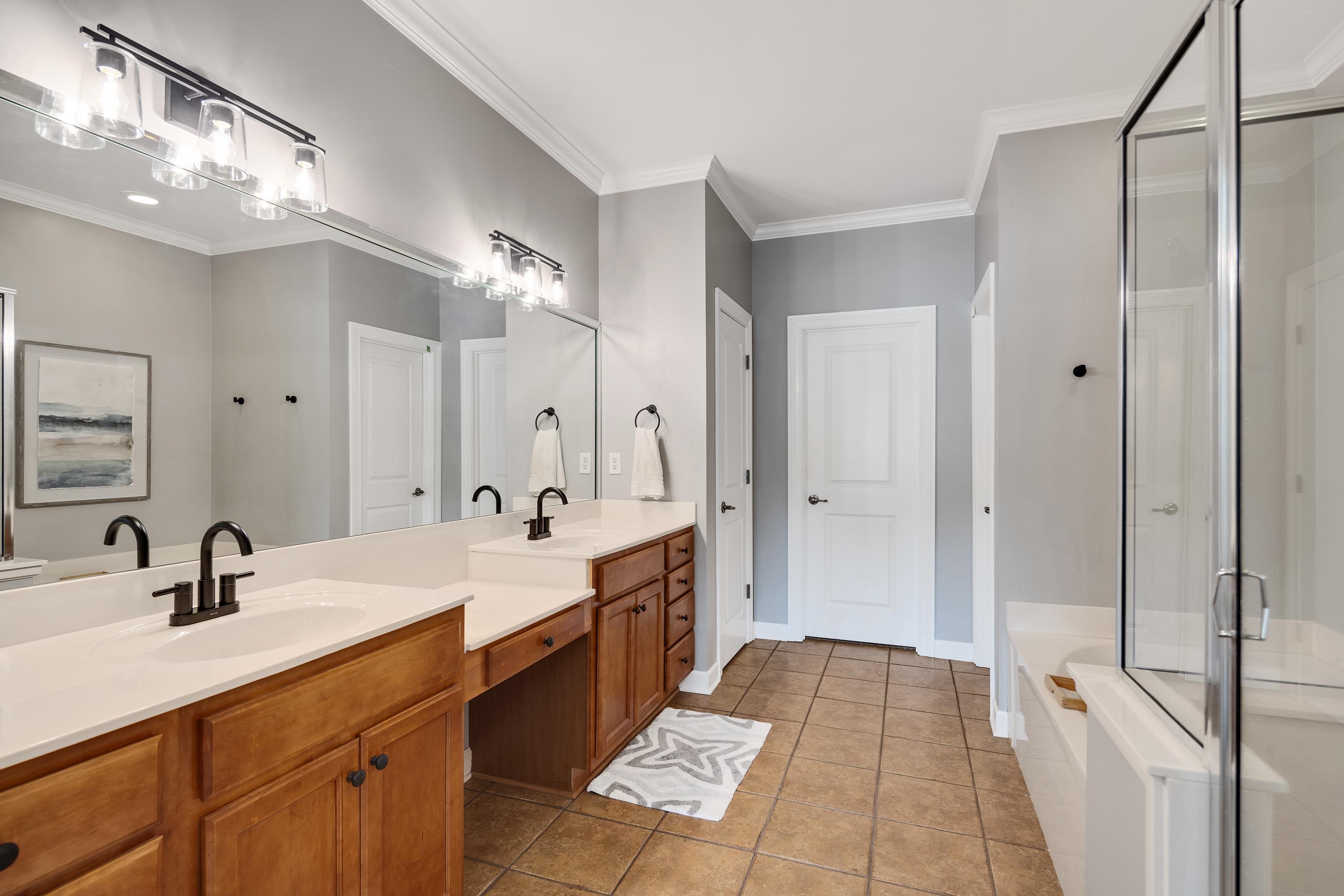 808 Deloach Lane Collierville, TN 38017 - Photo 18 of 40 a spacious bathroom with a double vanity sink mirror and double