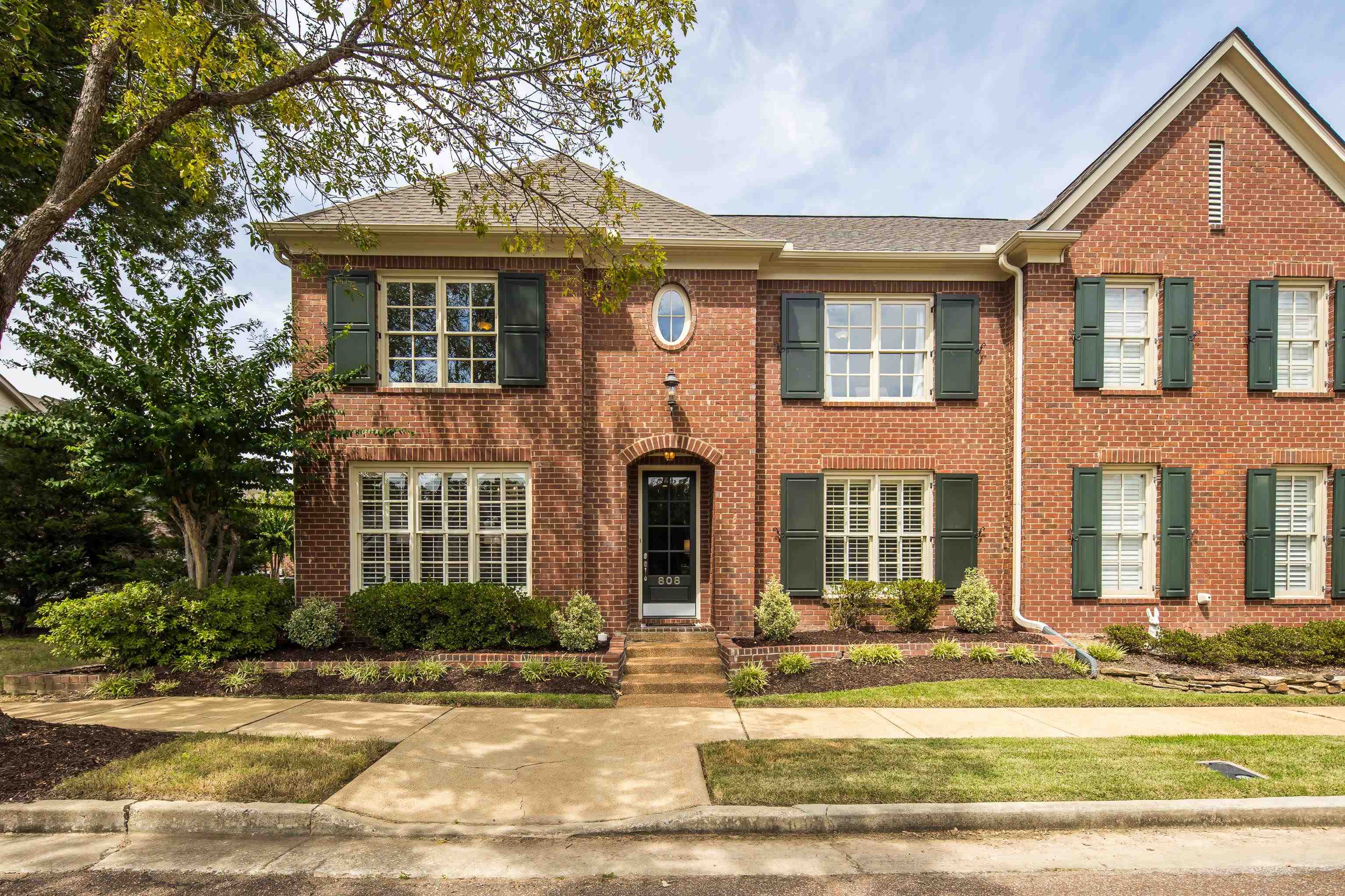 808 Deloach Lane Collierville, TN 38017 - Photo 2 of 40 front view of a brick house with a yard