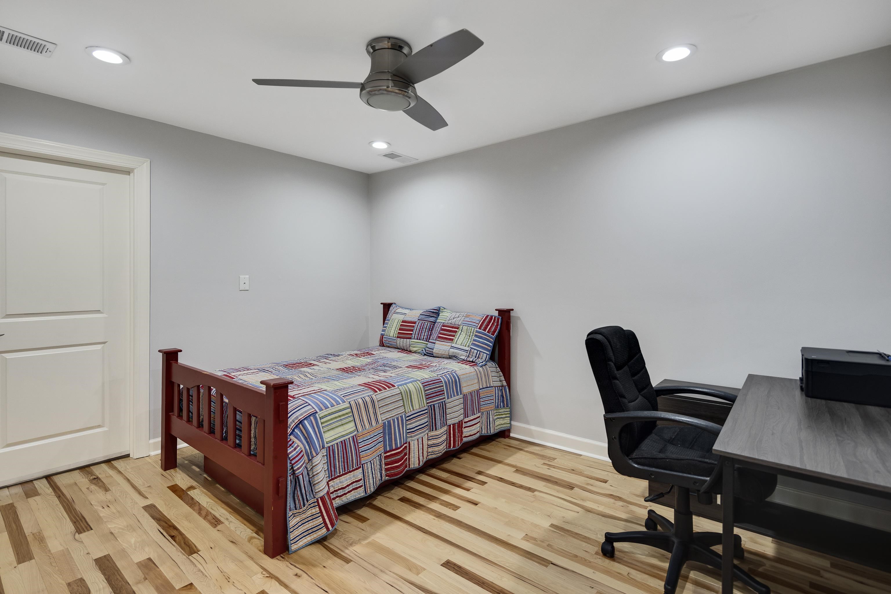 808 Deloach Lane Collierville, TN 38017 - Photo 22 of 40 a bedroom with a bed and a desk