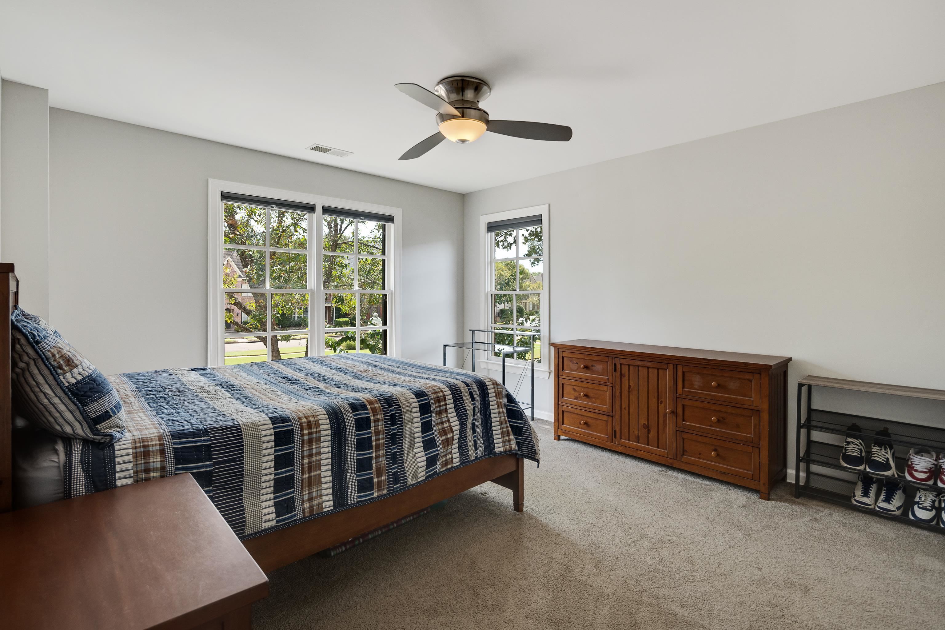 808 Deloach Lane Collierville, TN 38017 - Photo 23 of 40 a bed sitting in a bedroom next to a window