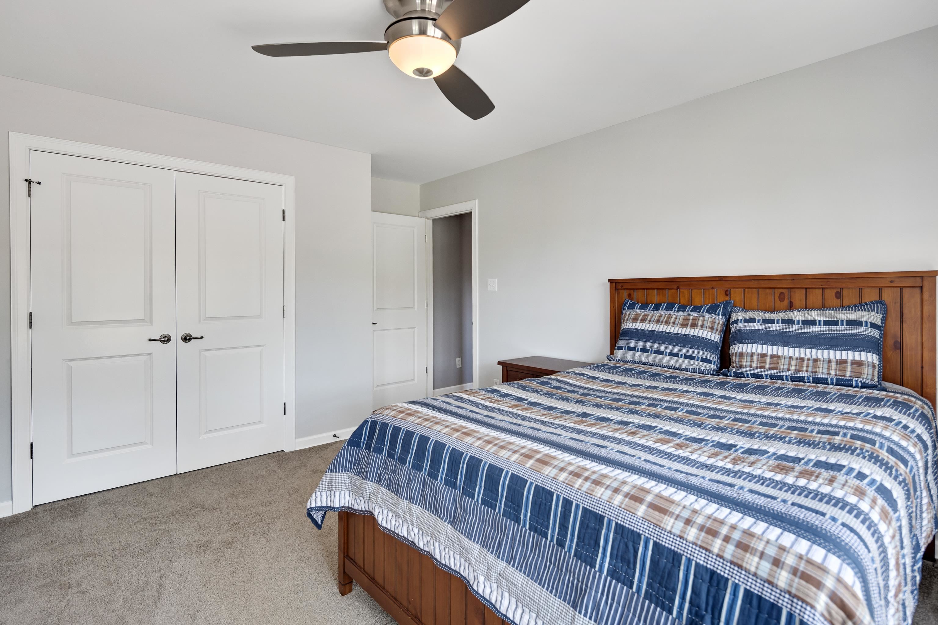 808 Deloach Lane Collierville, TN 38017 - Photo 24 of 40 a bedroom with a bed and ceiling fan
