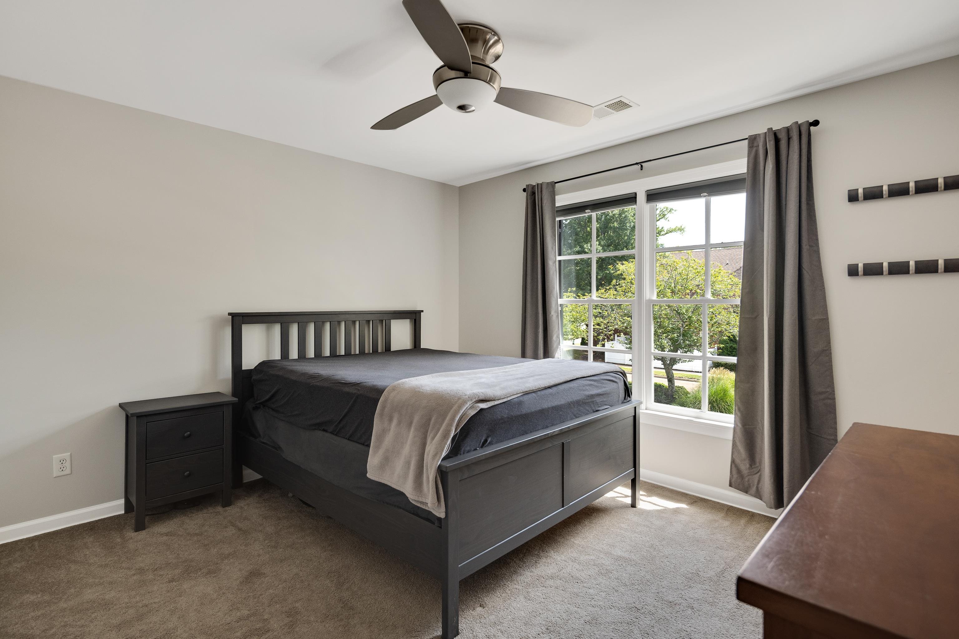 808 Deloach Lane Collierville, TN 38017 - Photo 26 of 40 a bedroom with a bed and a window