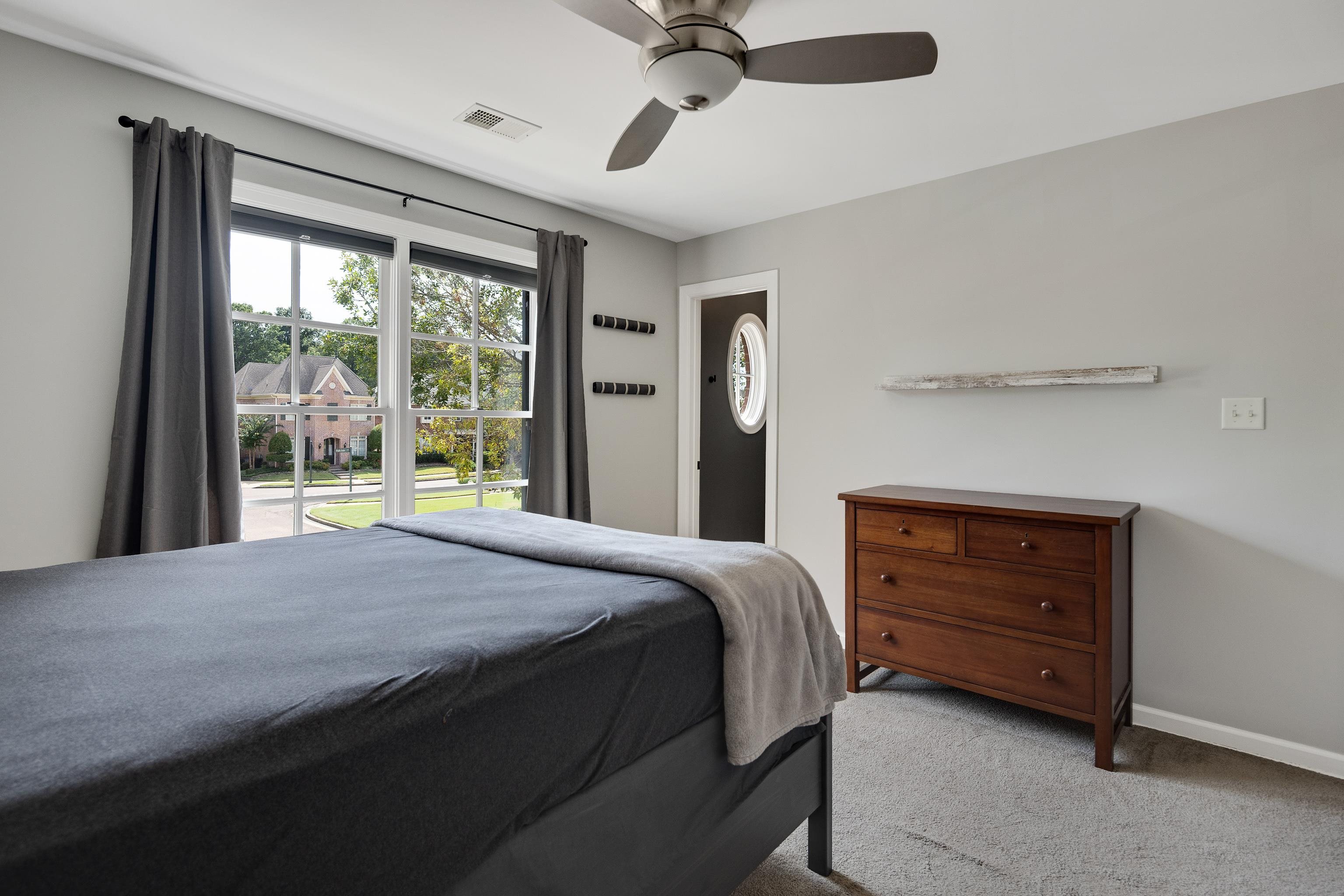 808 Deloach Lane Collierville, TN 38017 - Photo 27 of 40 a bedroom with a bed and a window