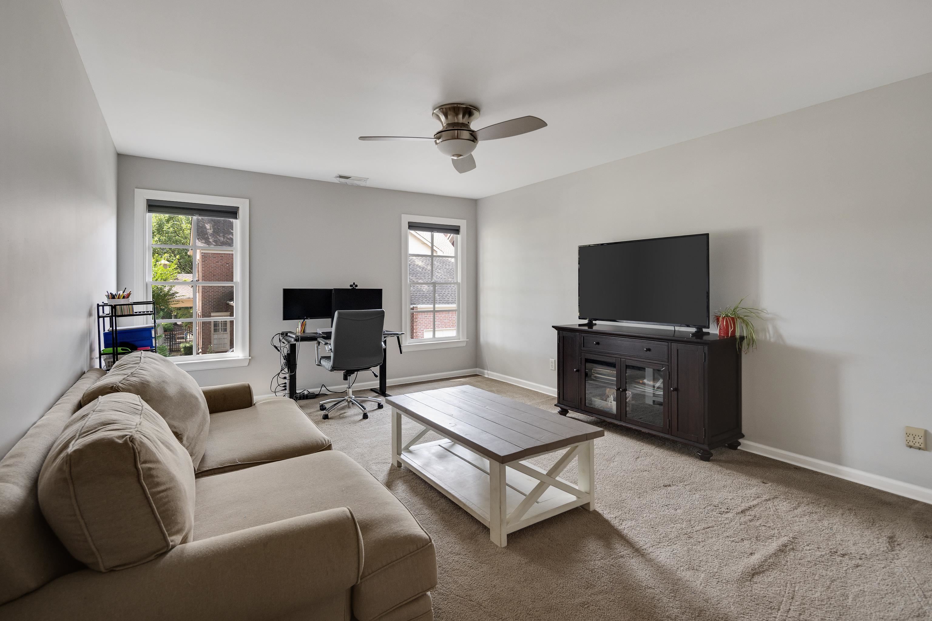 808 Deloach Lane Collierville, TN 38017 - Photo 28 of 40 a living room with furniture and a flat screen tv