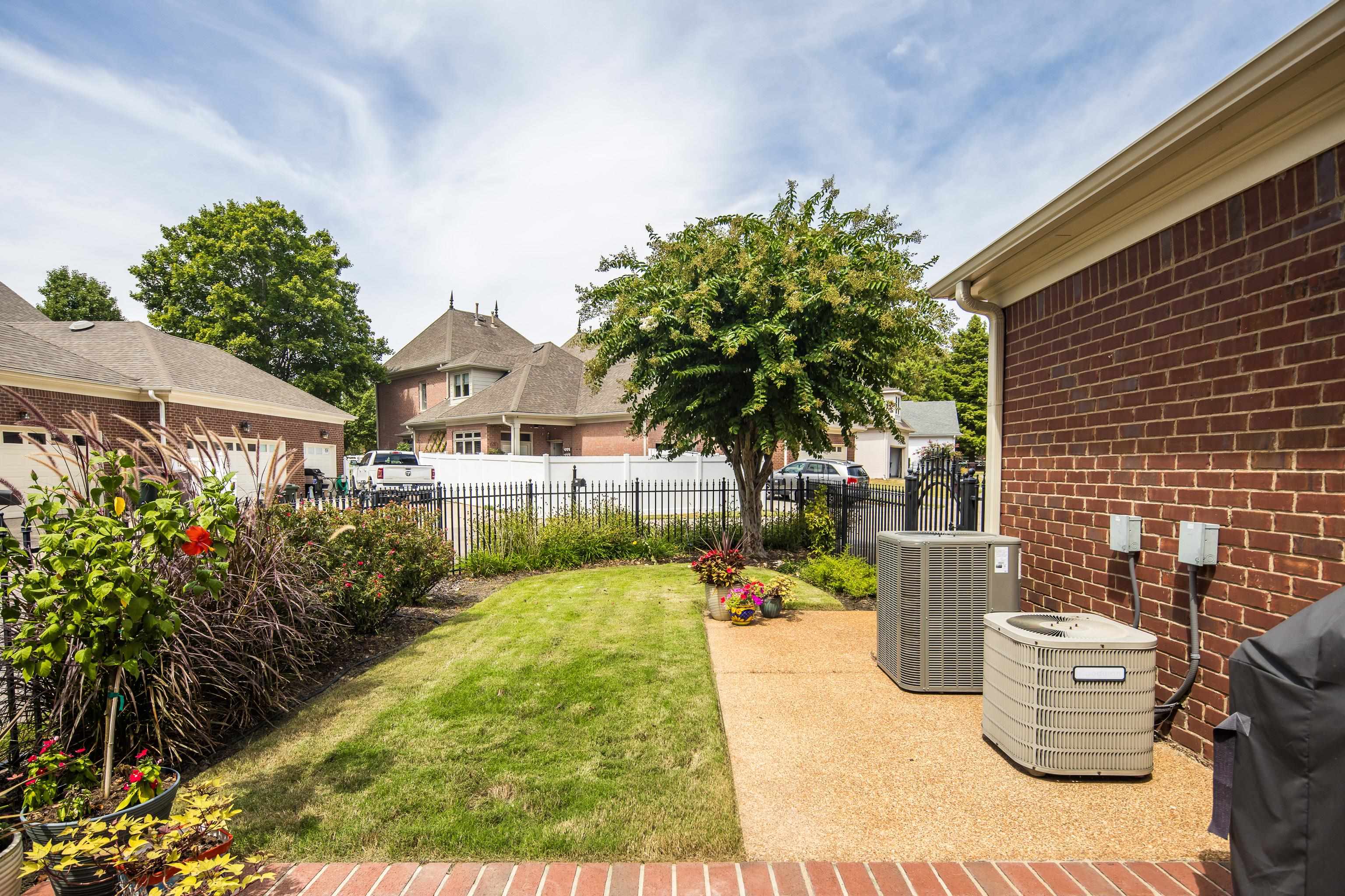 808 Deloach Lane Collierville, TN 38017 - Photo 32 of 40 a view of a house with backyard and sitting area