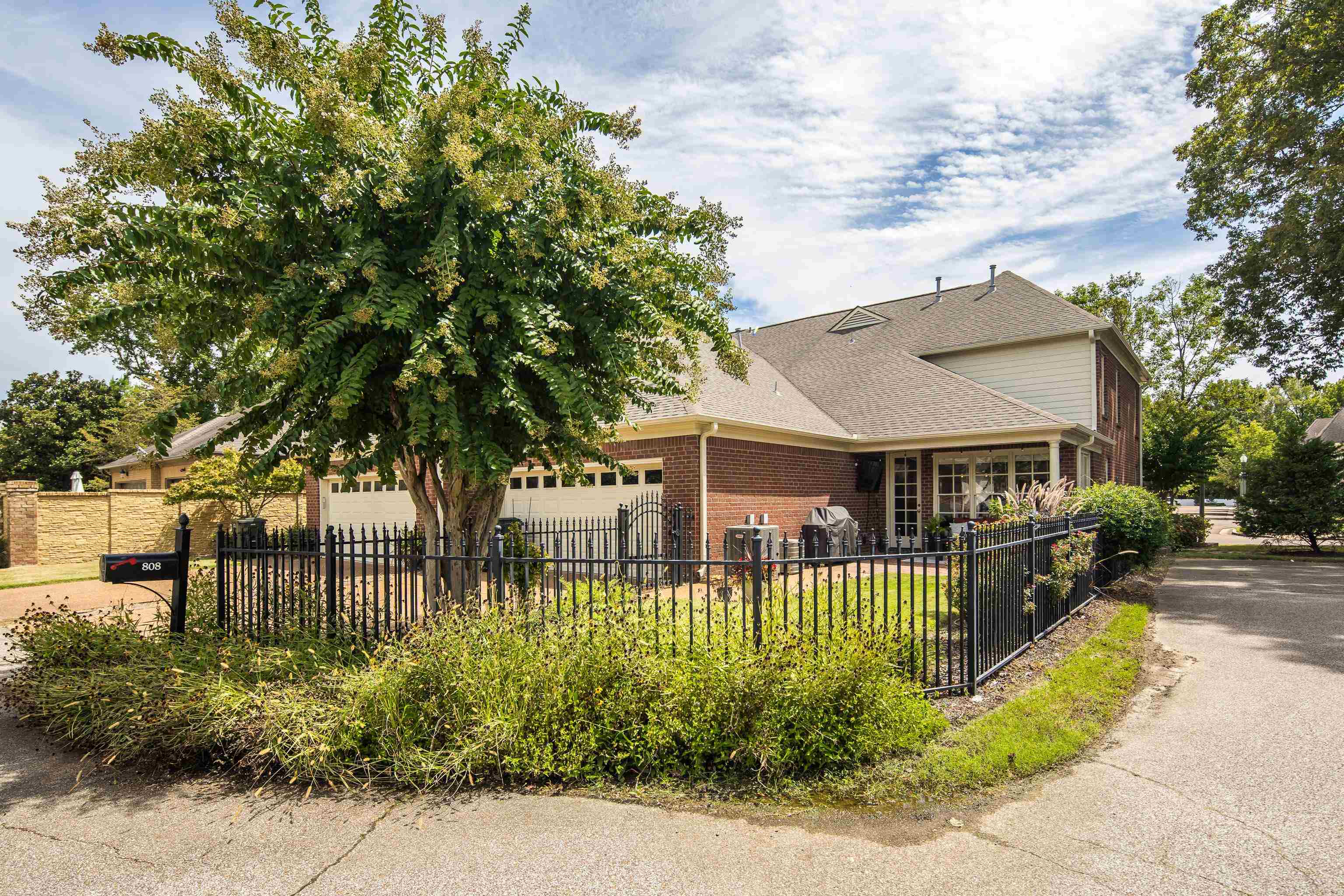 808 Deloach Lane Collierville, TN 38017 - Photo 36 of 40 a front view of a house with a garden
