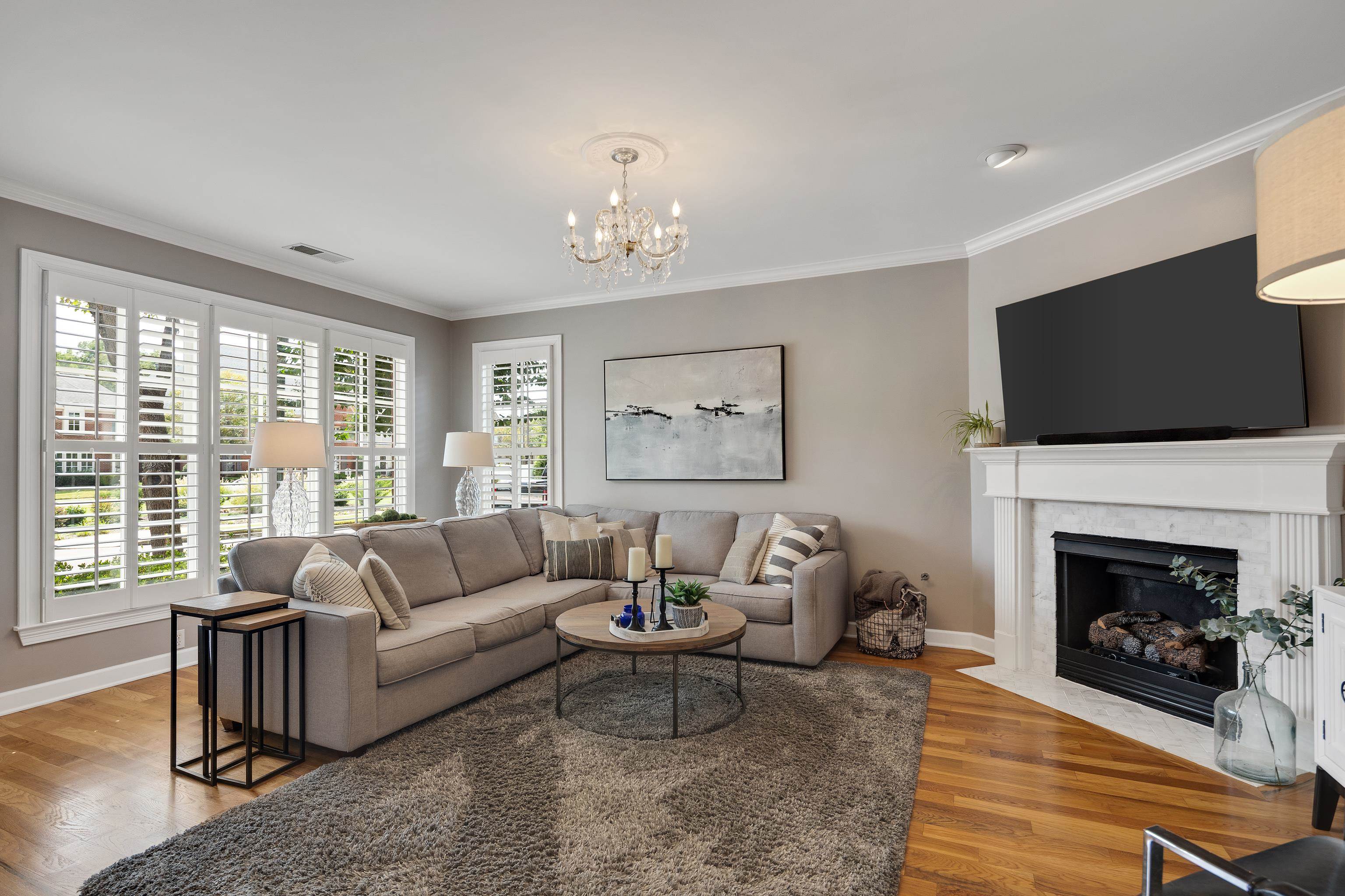 808 Deloach Lane Collierville, TN 38017 - Photo 6 of 40 a living room with furniture a fireplace and a flat screen tv