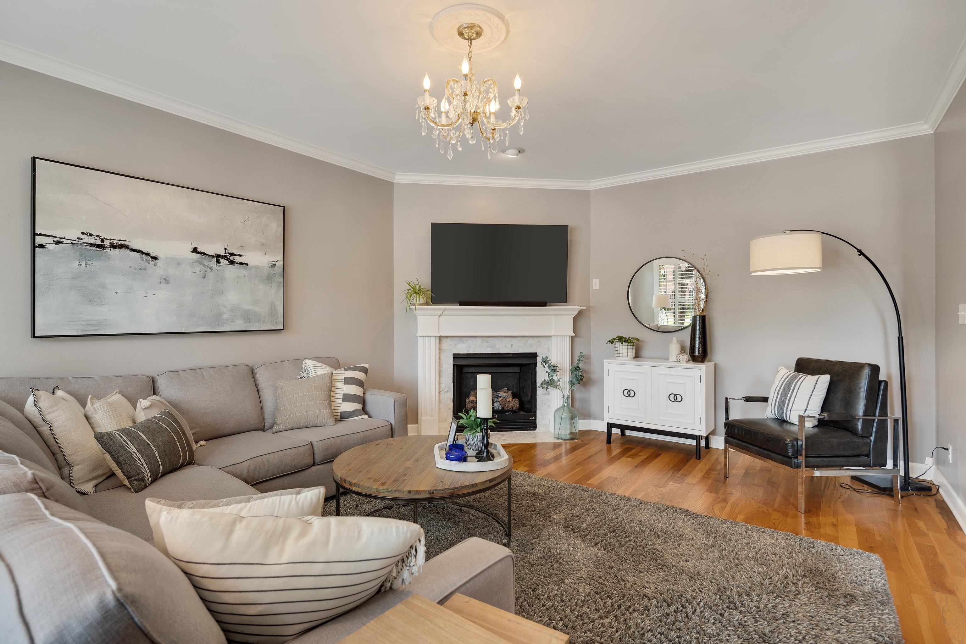 808 Deloach Lane Collierville, TN 38017 - Photo 7 of 40 a living room with furniture a fireplace and a flat screen tv