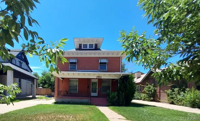 a view of a house with a garden