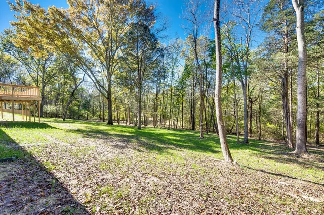 a view of a house with a street