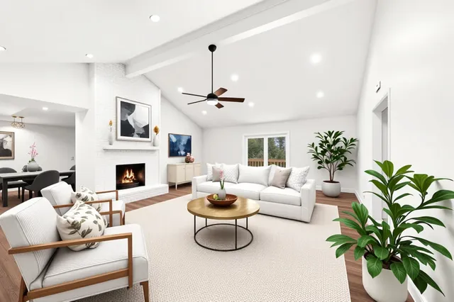a living room with furniture a chandelier and a fireplace
