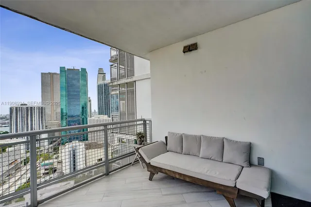 a view of a city with tall buildings