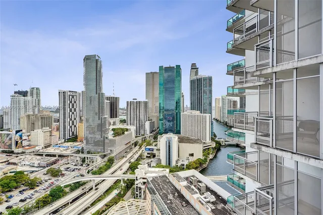 a view of city with tall buildings