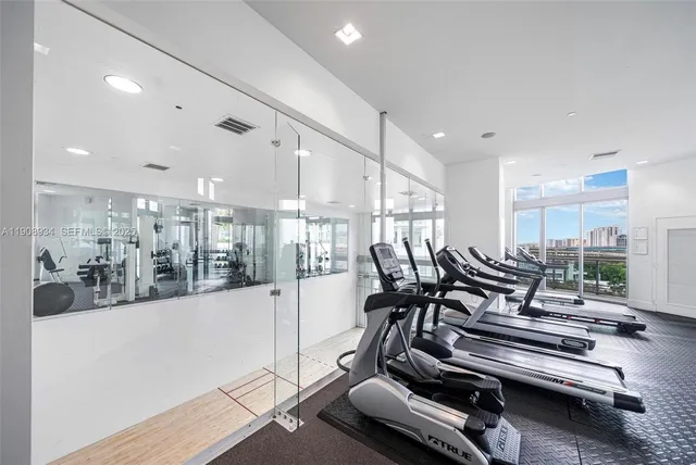 a view of a backyard with plants and a garage