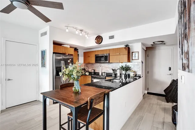 a view of a kitchen and living room