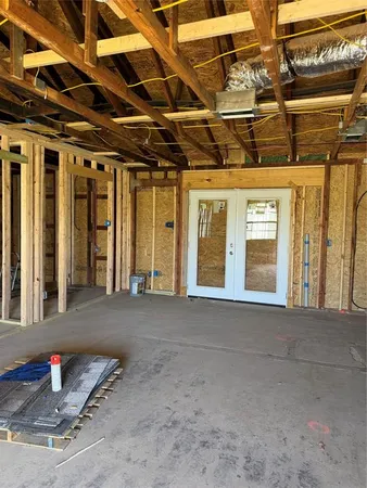 a view of a room with wooden walls