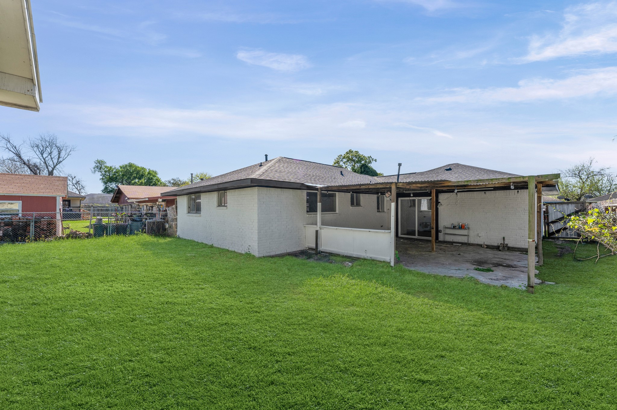 4519 Anice Street Houston, TX 77039 - Photo 21 of 25 a view of a yard with a house in the background