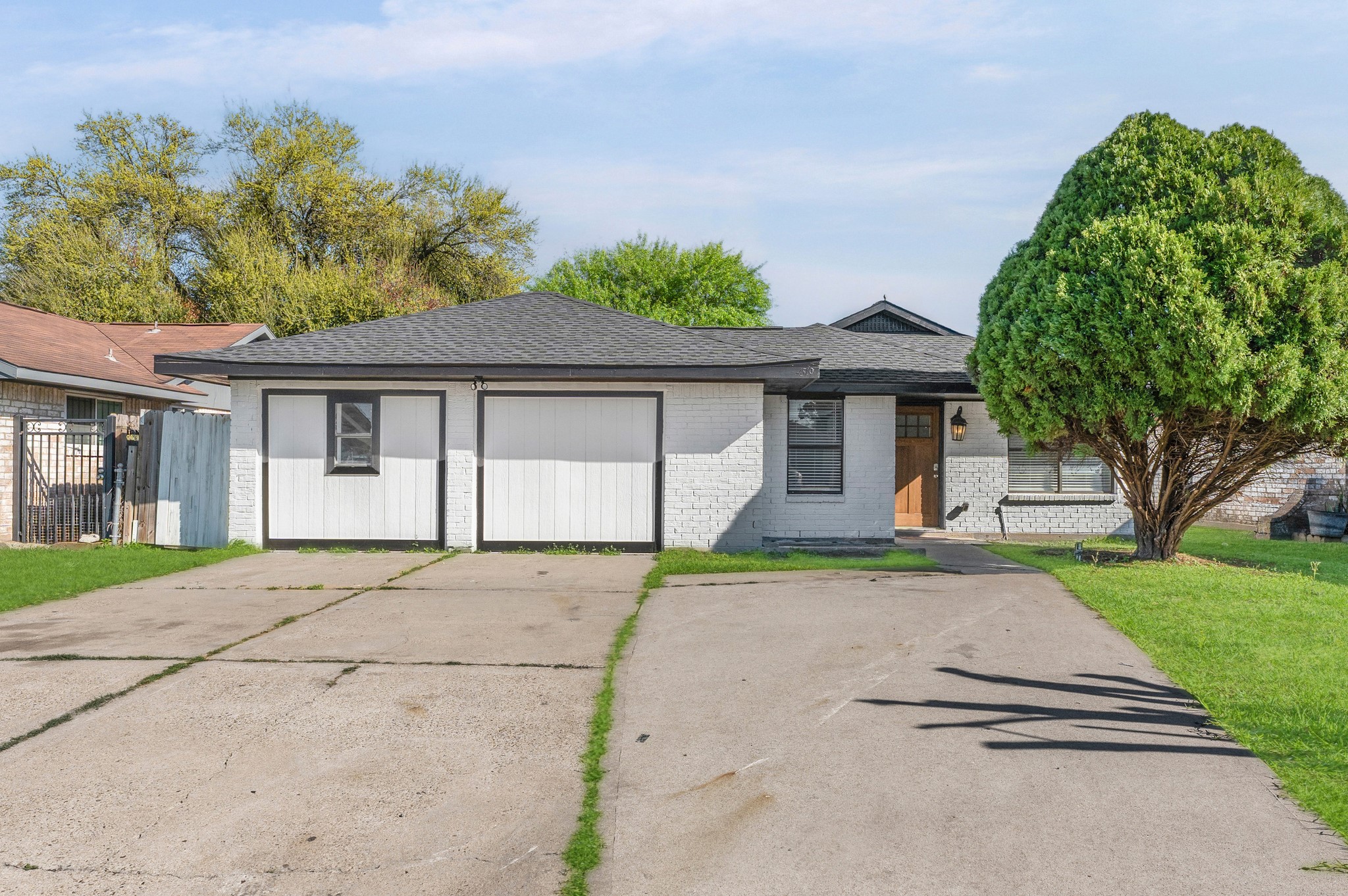 4519 Anice Street Houston, TX 77039 - Photo 22 of 25 front view of a house with a yard