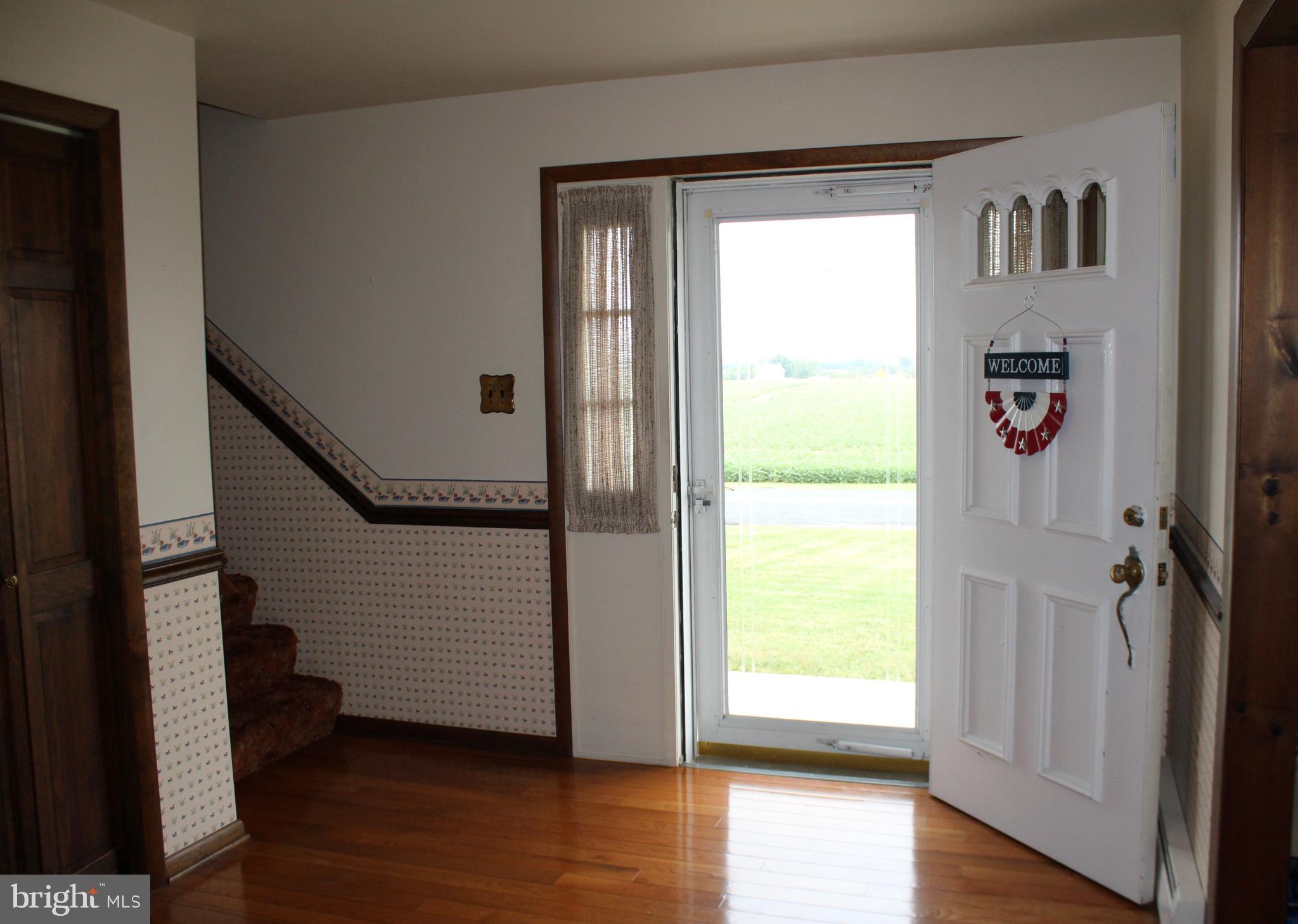 652 Cedar Ridge Road New Oxford, PA 17350 - Photo 14 of 17 a view of empty room with wooden floor and fan