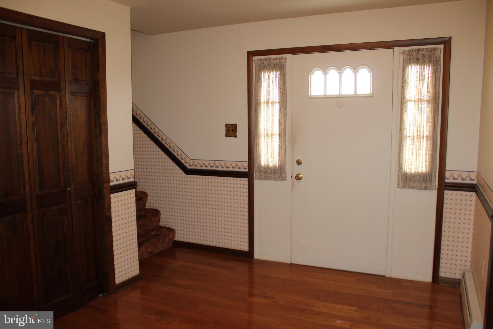 652 Cedar Ridge Road New Oxford, PA 17350 - Photo 15 of 17 a view of entryway with wooden floor and stairs