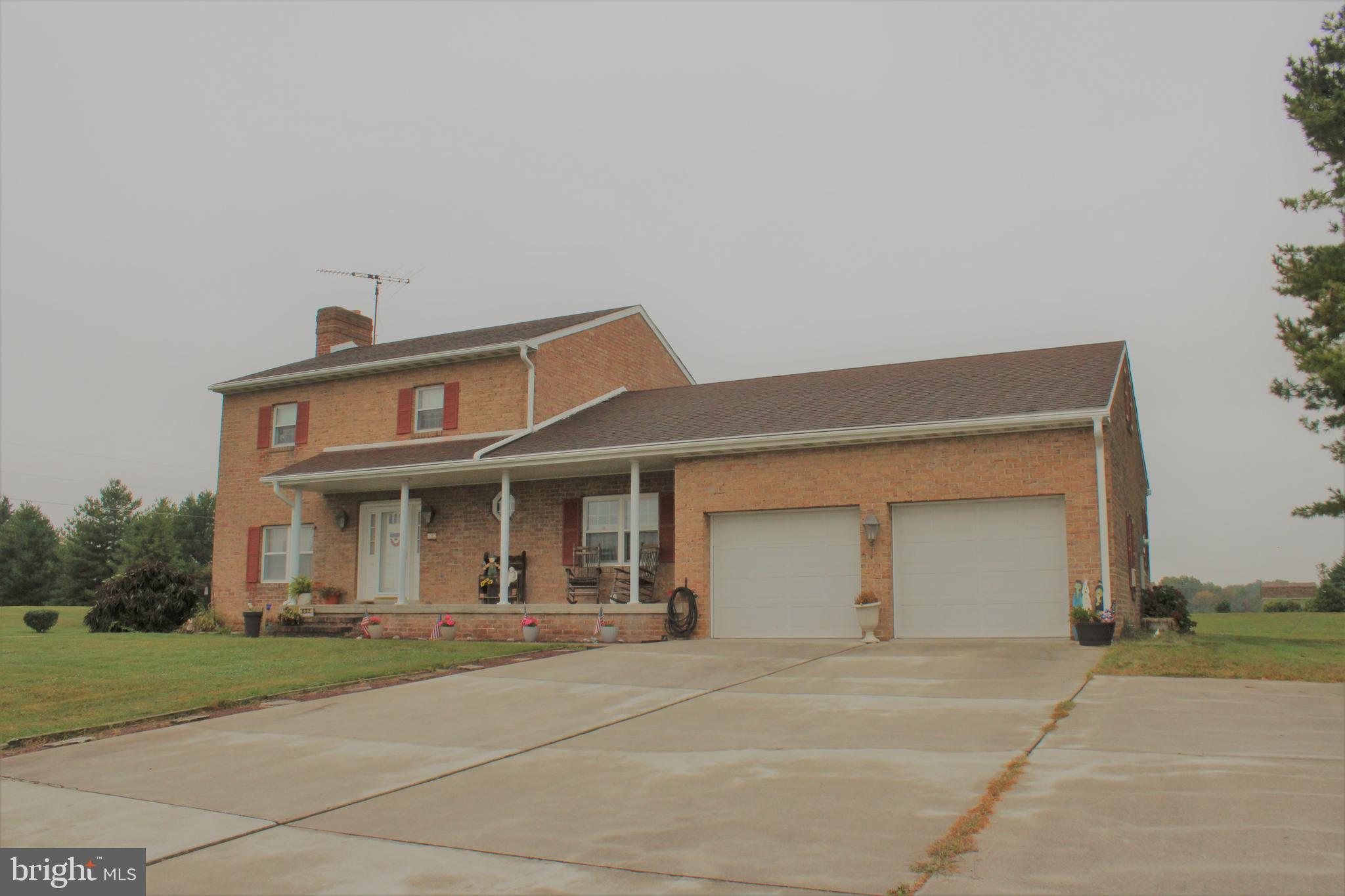 652 Cedar Ridge Road New Oxford, PA 17350 - Photo 3 of 17 front view of a house with a yard