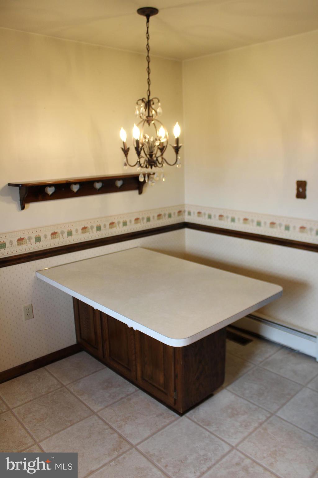 652 Cedar Ridge Road New Oxford, PA 17350 - Photo 9 of 17 a room with a table and chairs