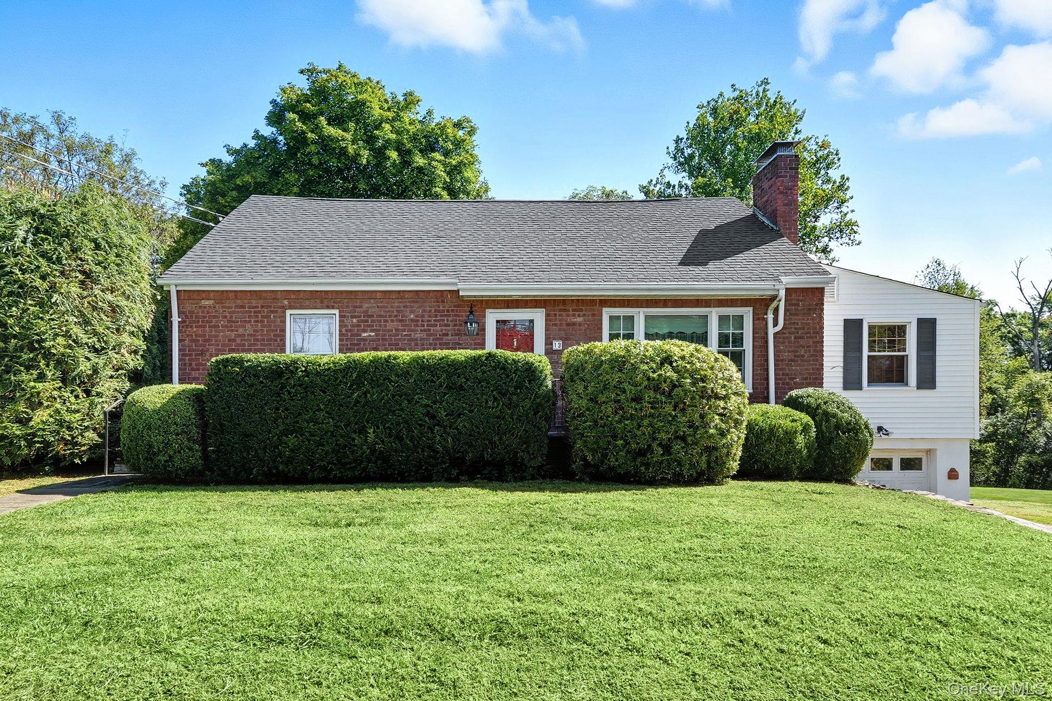 a view of a house with a garden