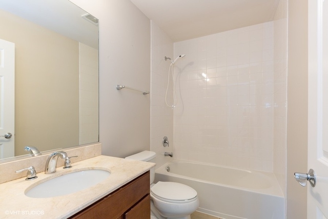 323 Aspen Pointe Road Vernon Hills, IL 60061 - Photo 11 of 12 a bathroom with a granite countertop sink toilet and shower