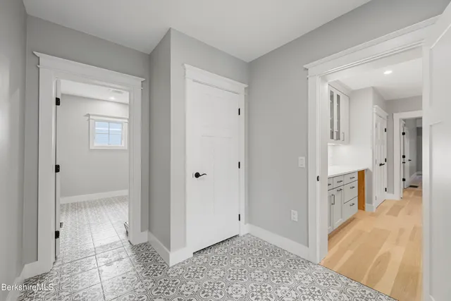 an aerial view of a house with a garden