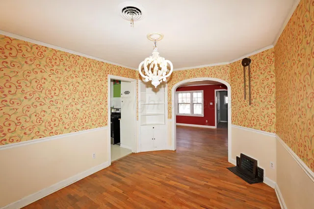 a kitchen that has a sink and a stove