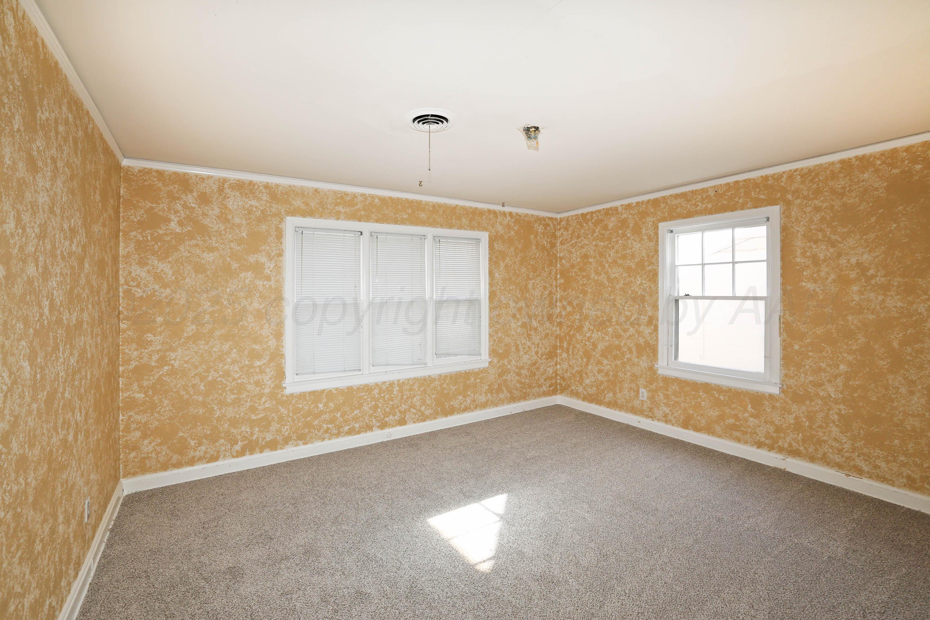 1528 South Lipscomb Street Amarillo, TX 79102 - Photo 18 of 24 a view of an empty room with a window