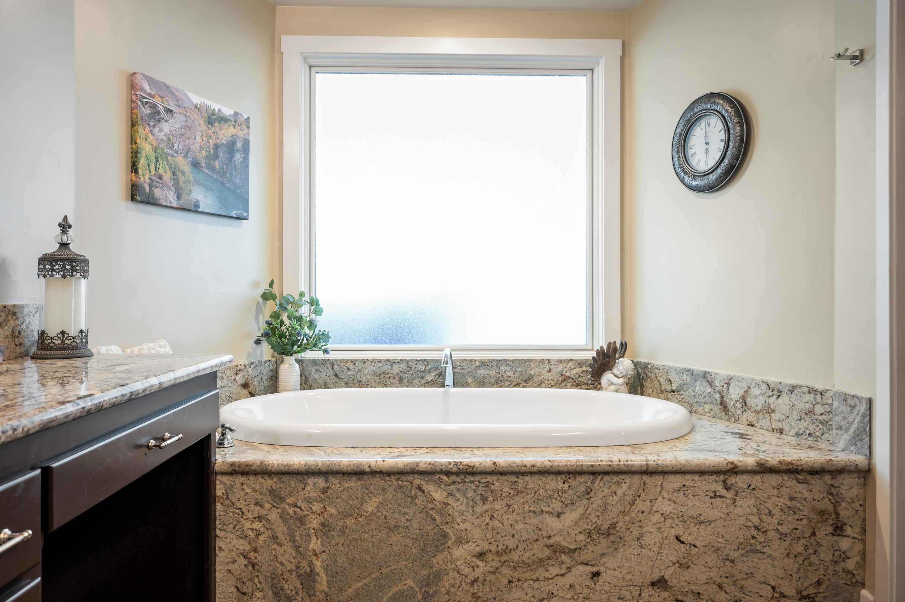 2550 Elk Grove Road Solvang, CA 93463 - Photo 27 of 74 a bathroom with a granite countertop sink and a mirror