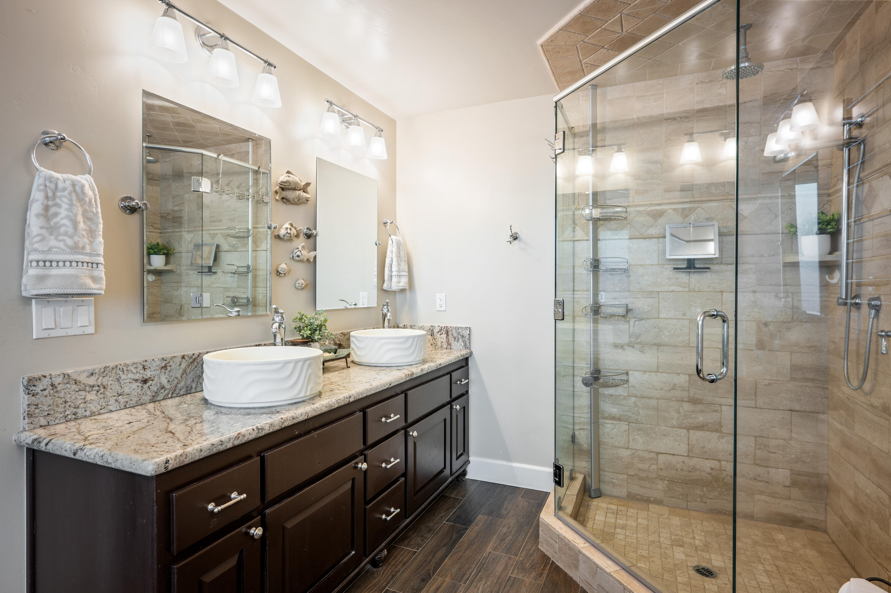 2550 Elk Grove Road Solvang, CA 93463 - Photo 28 of 74 a bathroom with a granite countertop sink a shower and a mirror