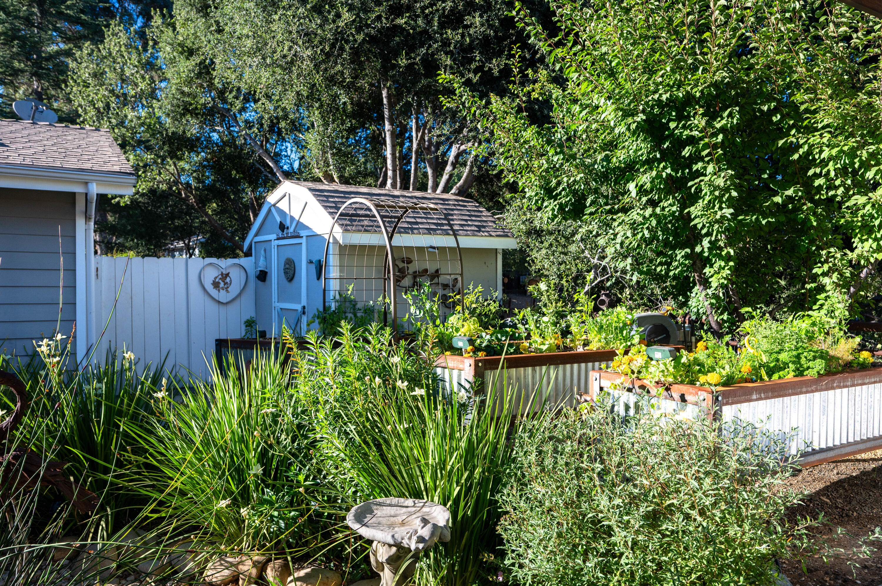 2550 Elk Grove Road Solvang, CA 93463 - Photo 42 of 74 a view of a house with a yard and garden
