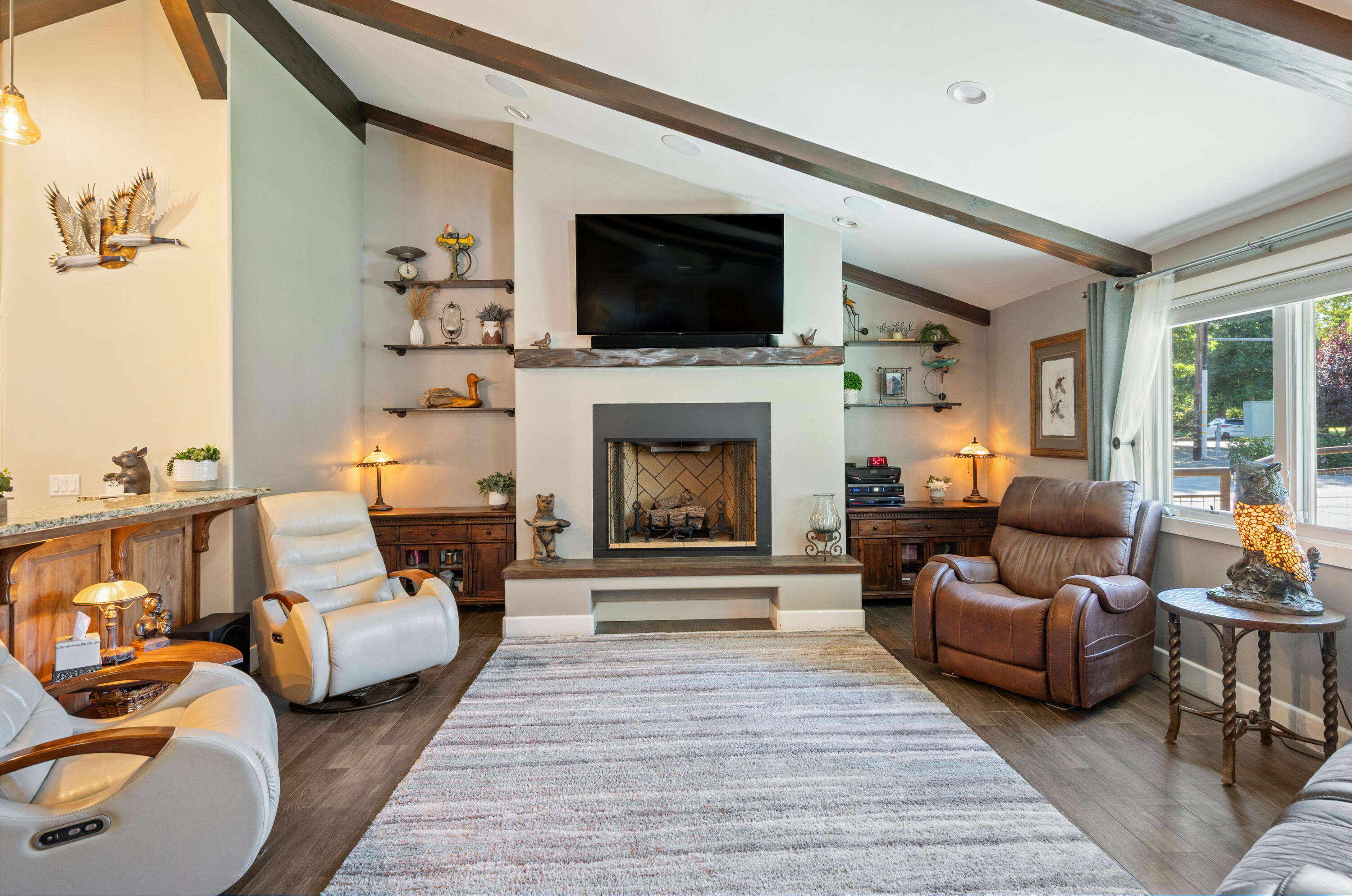 2550 Elk Grove Road Solvang, CA 93463 - Photo 5 of 74 a living room with furniture and a fireplace