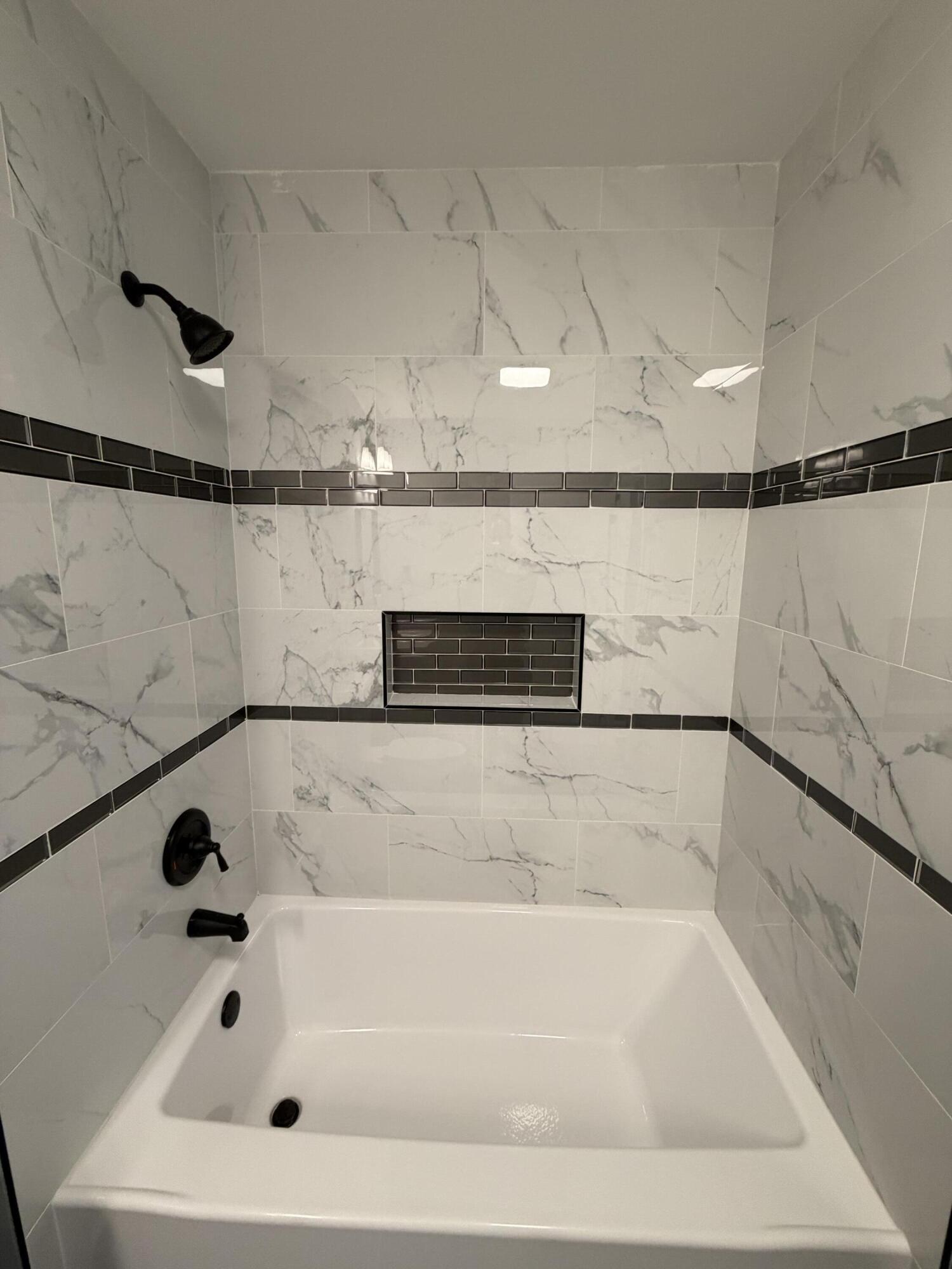 2425 Adams Street Gary, IN 46407 - Photo 12 of 26 a bathroom with a bathtub