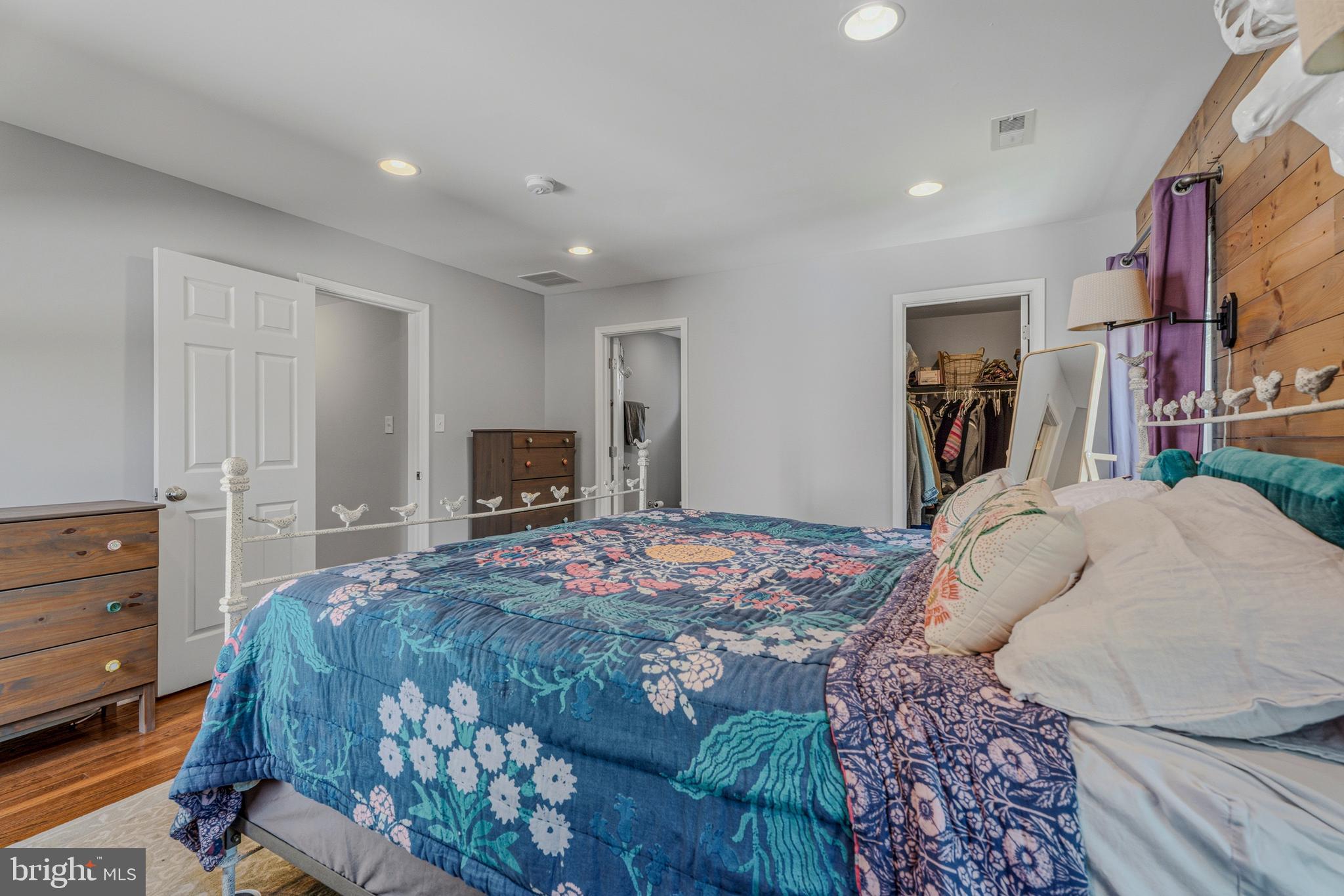 506 Brook Road Baltimore, MD 21286 - Photo 23 of 56 a bedroom with a bed and a flat screen tv