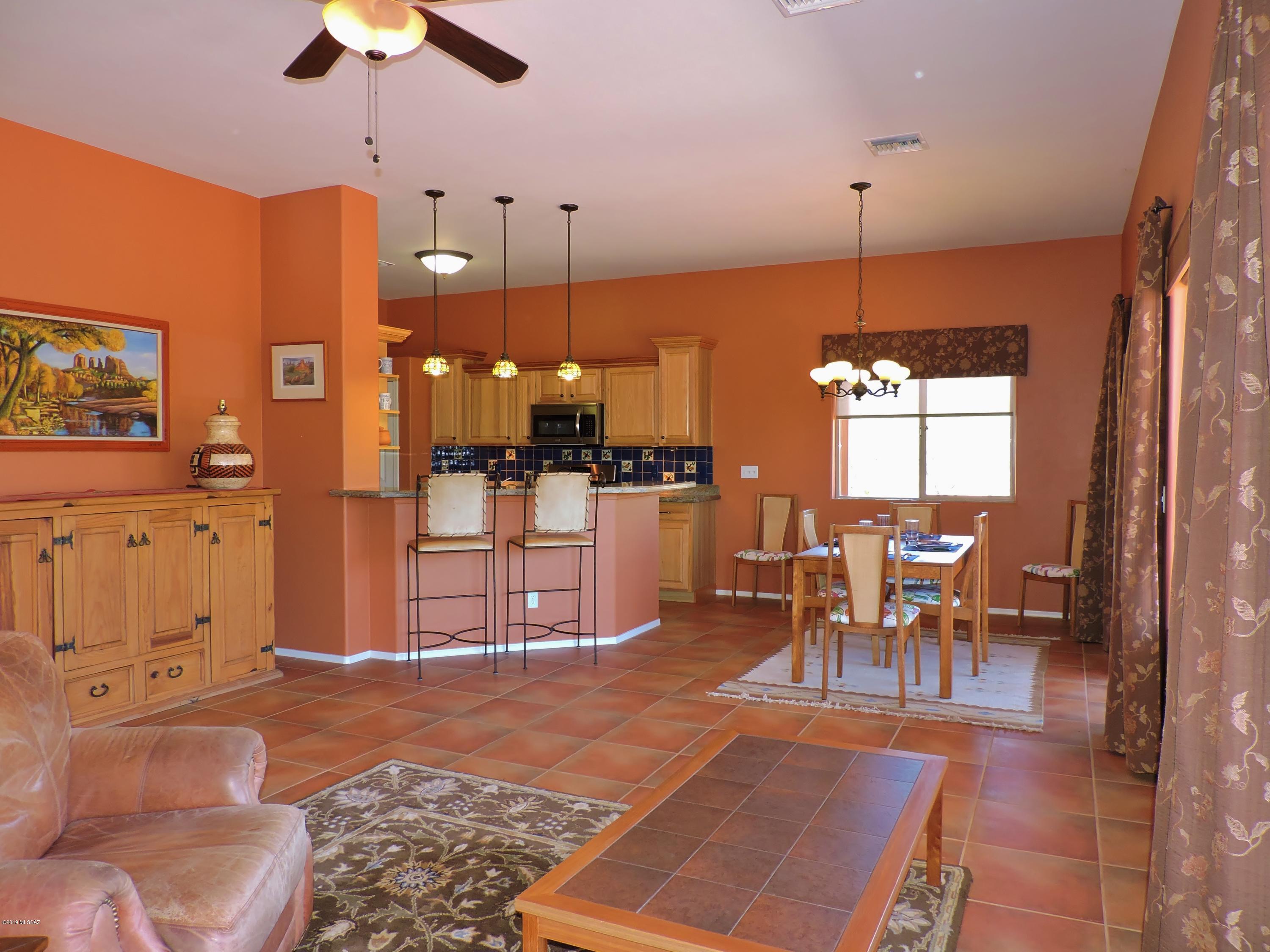1786 Zimmer Court Rio Rico, AZ 85648 - Photo 21 of 42 a view of a livingroom with furniture and a window